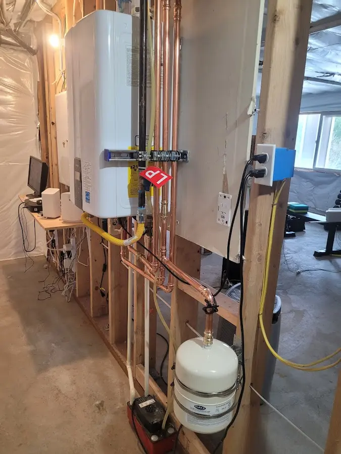 Licensed plumber repairing a kitchen sink in Westwego